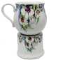 Preview: keramik tasse von 0,4 liter mit stövchen  inhalt verziert mit Orchidee