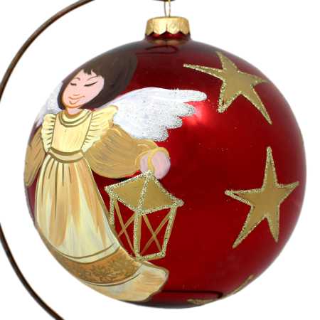 große rote glaskugel mit ständer handbemalt mit engelmotiv und beschriftet mit weihnachtsgrüßen