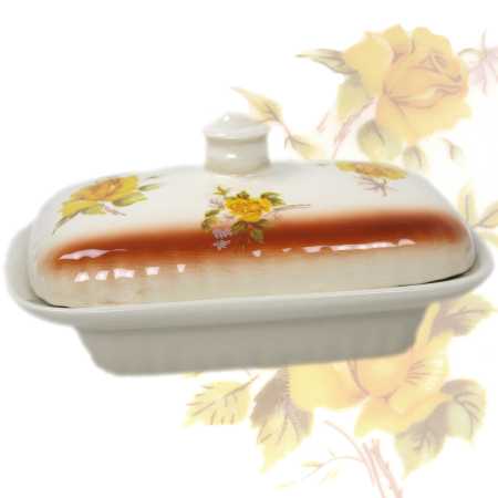 weiße keramik butterdose für ein stück butter von 250 gramm in ovaler form und verziert mit rosen in gelb