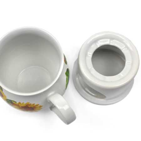 keramik tasse von 0,4 liter mit stövchen  inhalt verziert mit lavendel