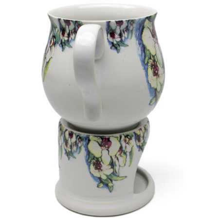 keramik tasse von 0,4 liter mit stövchen  inhalt verziert mit Orchidee