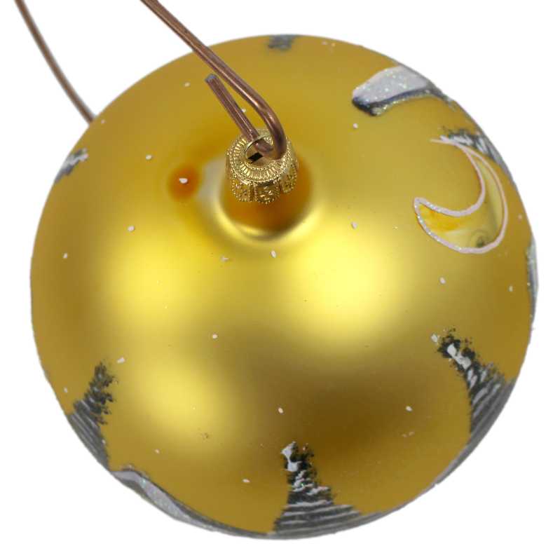 große glaskugel in gold mit staender und handbemalt mit landschaft mit rehen vor der kirche