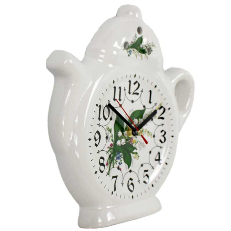 weiße keramik uhr in der teekanne form verziert mit maiglöckchen