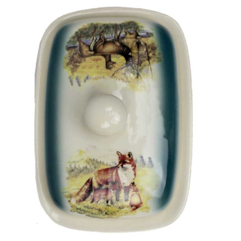 weiße keramik butterdose für ein stück butter von 250 gramm in ovaler form und verziert mit wild motiv