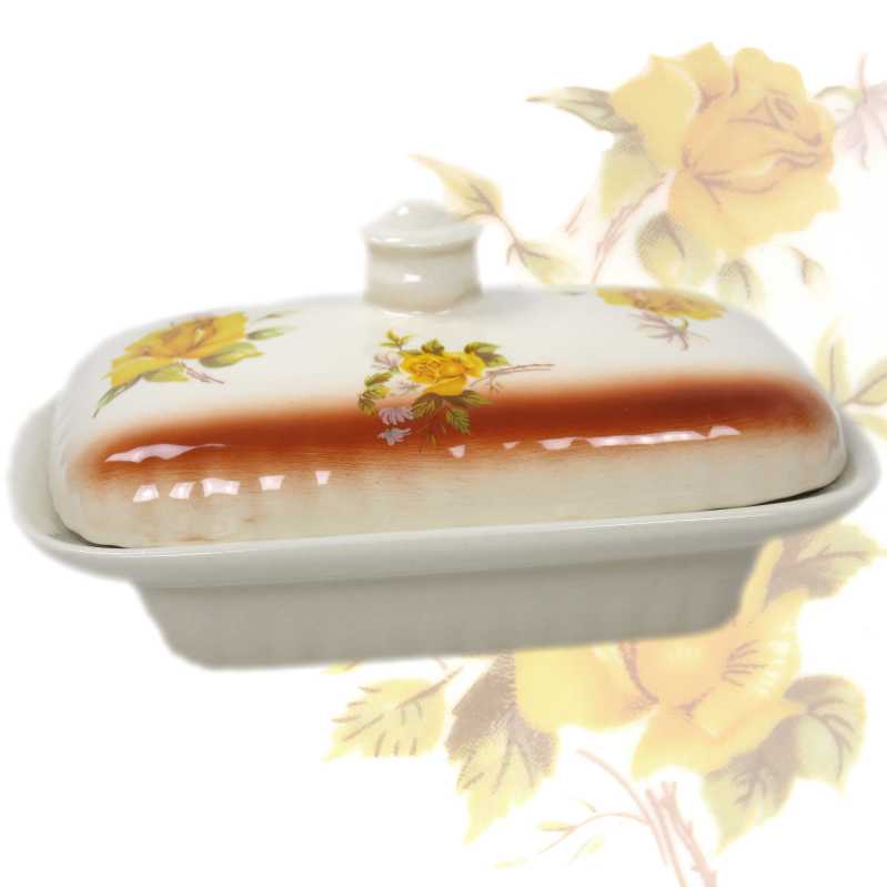 weiße keramik butterdose für ein stück butter von 250 gramm in ovaler form und verziert mit rosen in gelb