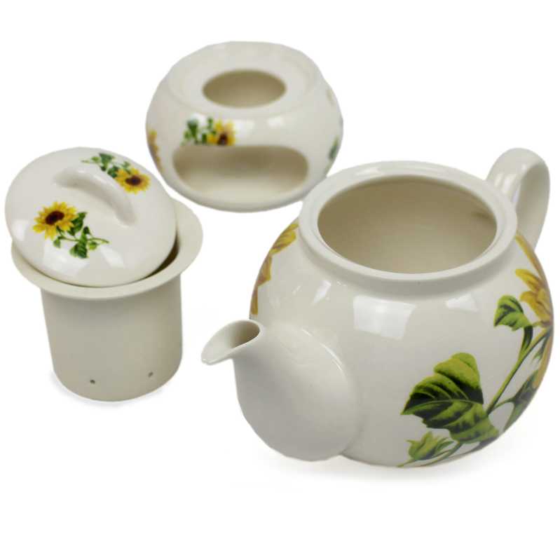 Teekanne aus weißer Keramik mit einem Liter Fassungsvermögen und Sieb und passendem Stövchen mit Mohnblumen