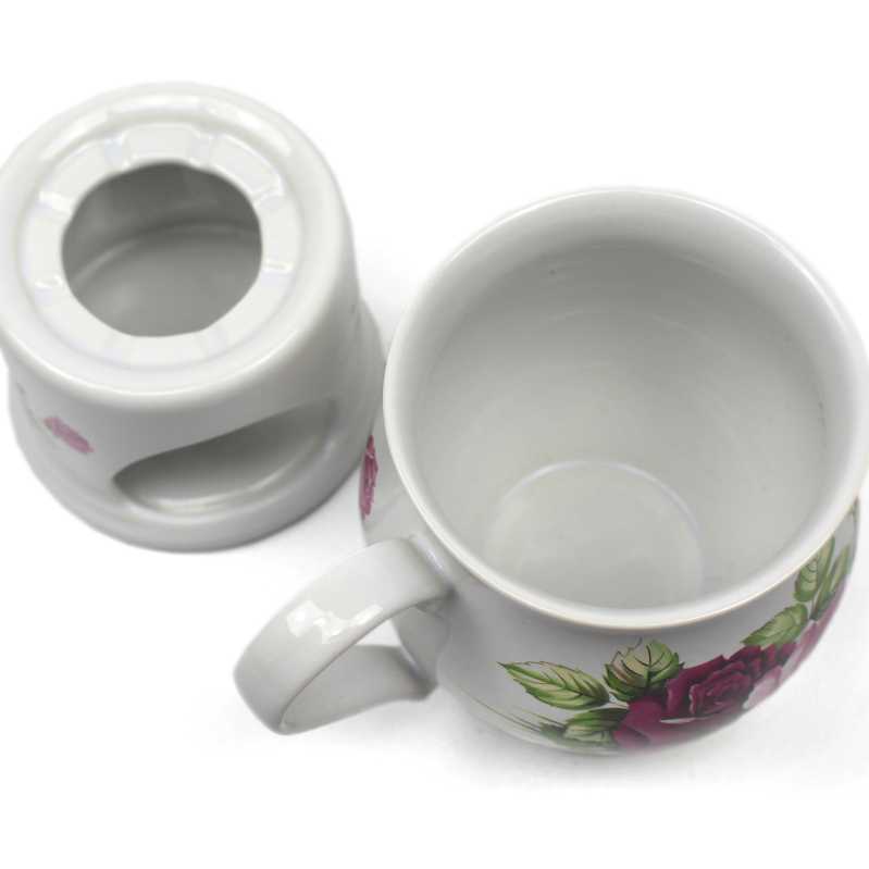 keramik tasse von 0,4 liter mit stövchen  inhalt verziert mit rosen